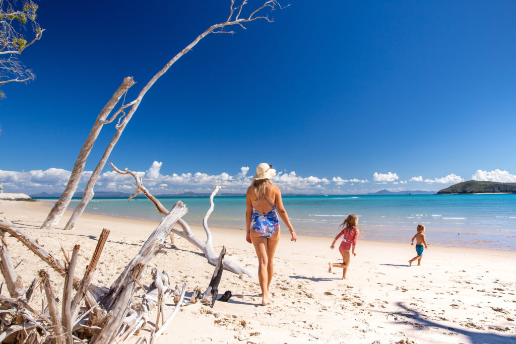 Family playing on beach at great keppel island